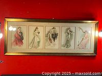 Framed set of five lithographs on a red wall, depicts the full collection in wooden frame with glass cover.