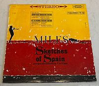 Front cover of the album showing the title 'Miles Sketches of Spain' with a trumpet player silhouette and significant wear.