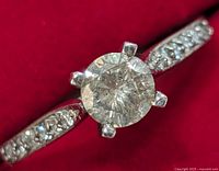 Diagonal top view showing center and shoulder diamonds