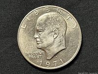 Obverse side showing the profile of President Dwight D. Eisenhower with the year 1971 and inscriptions LIBERTY and IN GOD WE TRUST.
