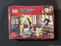 Front of box showing LEGO Harry Potter 4736 Freeing Dobby, 73 pieces, for ages 6-12, sealed with visible wear and corner damage