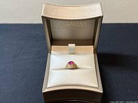 Ring displayed in open Charm jewelry box