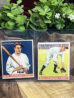Two Joe Cronin baseball cards in clear protective sleeves showing both front designs