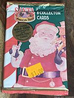 Front of sealed 1994 Santa Premier Edition collector card pack showing Santa illustration and gold certificate insert callout.