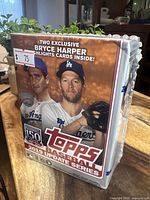 Front view of sealed 2019 Topps Update baseball blaster box with Bryce Harper card announcement and Dodgers players Clayton Kershaw and a teammate on front.