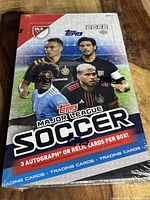 Front view of the 2022 Topps MLS Soccer box showing players and product highlights