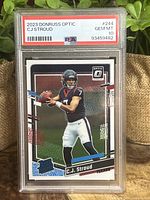 Front of the 2023 Donruss Optic C.J. Stroud rookie card slabbed and graded PSA 10 Gem Mint showing the player in action and card details.