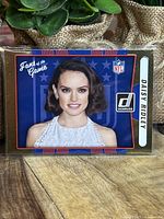 Front of Daisy Ridley NFL Fans of the Game Star Wars trading card showing her portrait with NFL and Donruss logos.