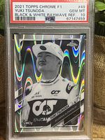 Front of the 2021 Topps Chrome Formula One rookie card of Yuki Tsunoda showing the black and white image with raywave holographic effect, graded PSA GEM MT 10.
