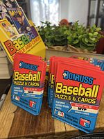 Eight sealed packs of 1989 Donruss Baseball Puzzle & Cards, showing branded packaging with puzzle and MVP bonus cards information.