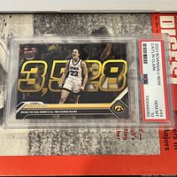 Front of the graded card in plastic PSA case showing Caitlin Clark with score 3,528 and Iowa logo