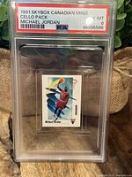 Photo of the mini cello pack card inside PSA graded encasement with label visible
