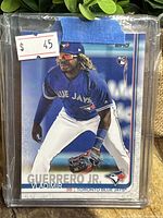 Photo showing a sealed single 2019 Topps Variations baseball card featuring Vladimir Guerrero Jr. in a plastic protective case priced at $45.