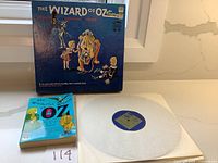 Vintage Wizard of Oz box set with box, book, and vinyl record shown