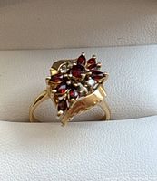 Front view showing cluster of garnets and diamonds