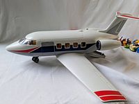 Side view of Playmobil wheeled jet showing shape and paint details