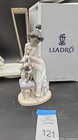 Front view of the figurine with Lladro box and original foam packaging