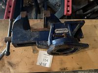 Top view of the blue Mastercraft vise with a swivel base, showing the branding and the clamping jaws.