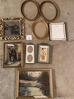 Overview of all nine vintage frames and artwork including paintings and mirror