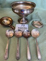 Overview of all pieces arranged on green fabric