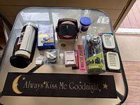 Top view of all items on glass table with visible text on table mat