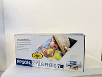 Photo of Epson Stylus Photo 780 printer box front showing branding and model information.