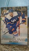 Front of the Noah Dobson jumbo Young Guns hockey card showing the player in Islanders uniform.
