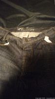 Front view of Parasuco jeans showing waistband, button, zipper and front pockets