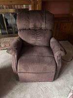 Front view of brown fabric power lift recliner chair