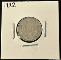 Front side of 1922 Canadian 5 cent coin showing 'FIVE 5 CENTS', maple leaves, and date '1922'. Coin mounted in white holder.