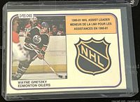 Front of the 1981-82 O-Pee-Chee Wayne Gretzky NHL Assists Leader trading card #383 showing player image and NHL logo with bilingual text.