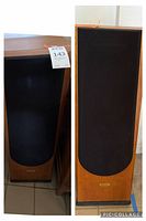 Front view of both speakers showing black fabric grille, cherry veneer cabinet and gold Spendor badge