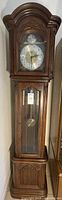 Front view of wooden grandfather clock case