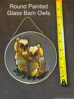 Round painted glass barn owls stained glass panel with chain for hanging, approx 10 inches diameter shown next to tape measure