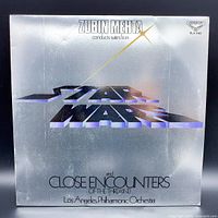 Front cover of the vinyl record showing Zubin Mehta conducting suites from Star Wars and Close Encounters of the Third Kind, Los Angeles Philharmonic Orchestra.