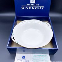 Givenchy porcelain bowl displayed in original blue Givenchy box showing scalloped edge and floral details