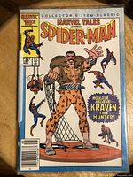 Front cover of Marvel Tales Spider-Man comic showing Kraven the Hunter captured in a spider web, with multiple Spider-Man images.