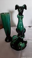 Photo showing all three items: dog figurine, swan planter, and vase