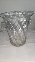 Clear crystal champagne bucket showing front view with molded handles on sides and slightly flared rim.