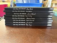 Stack of 7 Little People Big Dreams books showing titles of each book's subject on the spine.