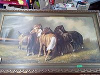 Full view of the oil painting showing six horses with textured brushstrokes and a decorative gold frame