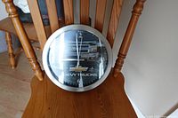 Front view of Chevy Trucks wall clock on chair
