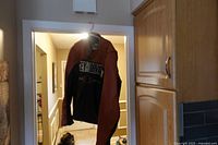 Front view of Harley-Davidson leather jacket hanging