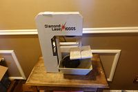 Full view of Diamond Laser 1000S band saw on table