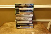 Front view of stacked Xbox game cases
