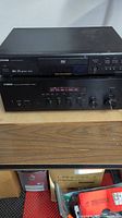 Yamaha RX-396 stereo receiver and Toshiba SD-K320 DVD player stacked, showing front panels and controls.