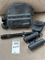 Overview of all items included: Tasco binoculars, monocular telescope, Tasco carrying bag, Bushnell case.