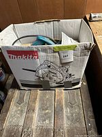 Closed box showing Makita brand and product illustration