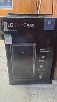 Front of original box showing LG PuriCare branding and 50 pint capacity.