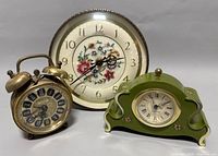 View of 3 vintage collectible clocks showing sizes and details